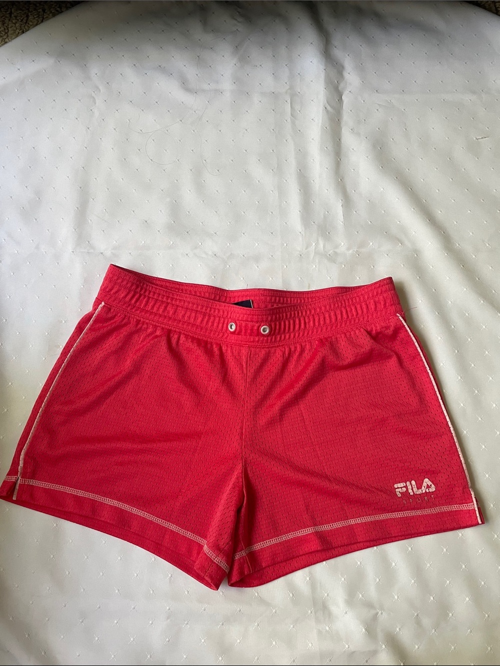 FILA Women’s Coral Pink Athletic Shorts with Contrast Stitching